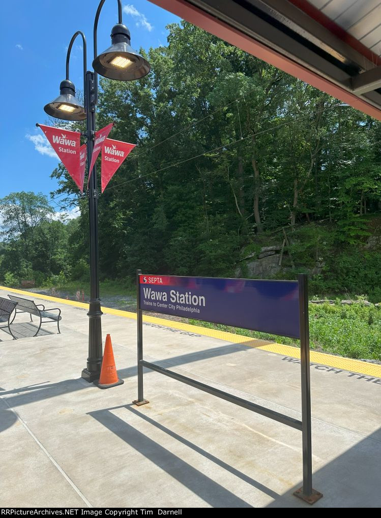Wawa station sign & flags.